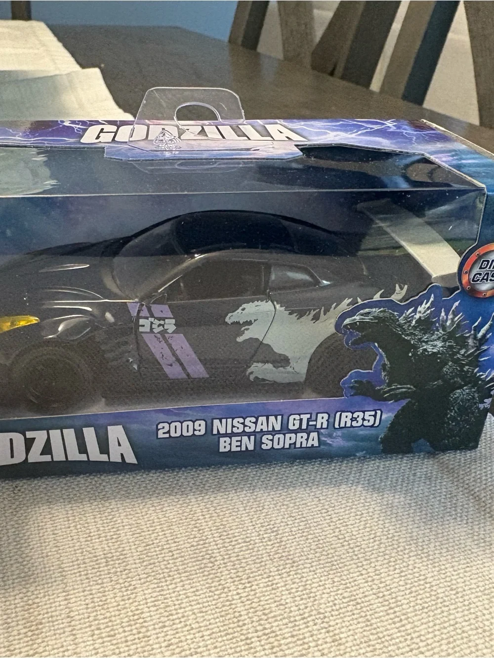 Jada die-cast 1:24 Godzilla GT-R (R35),Ghost Busters Hearse,Transformer Truck.